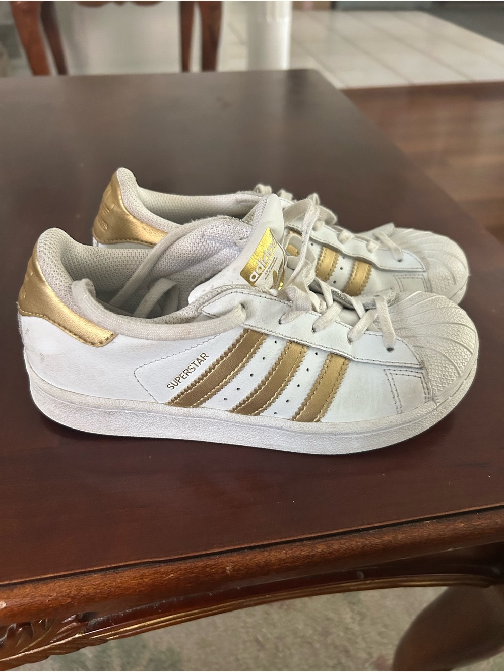 adidas Kids Superstar Sneakers in White and Gold Metallic